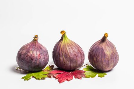 Ripe tasty figs on a white backgroundの写真素材