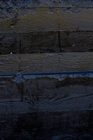 Black resin wall texture with scratches and cracks.の写真素材