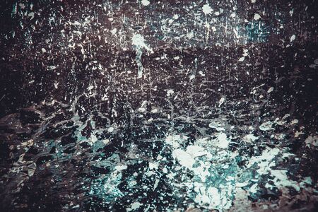 Scary black texture with white spots, scratches, and cracks.の写真素材
