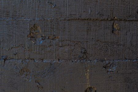 Black resin wall texture with scratches and cracks.の写真素材