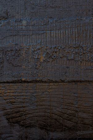 Black resin wall texture with scratches and cracks.の写真素材