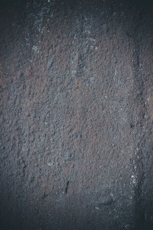 Black resin wall texture with scratches and cracks.の写真素材
