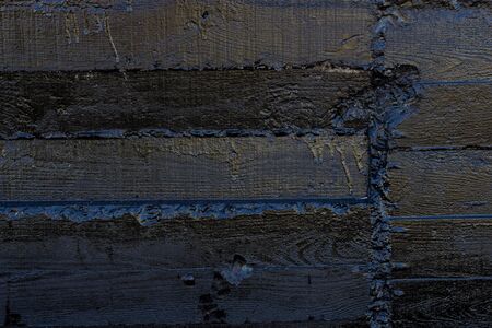 Black resin wall texture with scratches and cracks.の写真素材