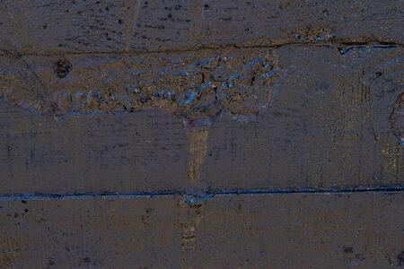 Black resin wall texture with scratches and cracks.の写真素材