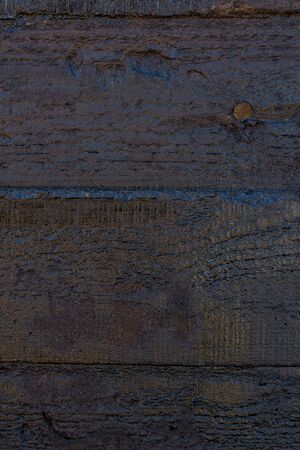 Black resin wall texture with scratches and cracks.の写真素材