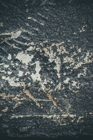 Scary black texture with white spots, scratches, and cracks.の写真素材
