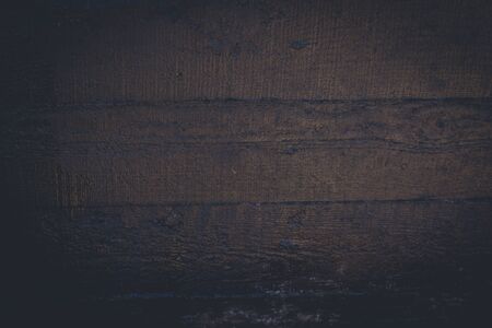 Black resin wall texture with scratches and cracks.の写真素材