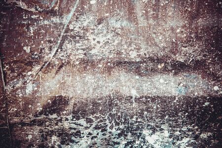 Scary black texture with white spots, scratches, and cracks.の写真素材