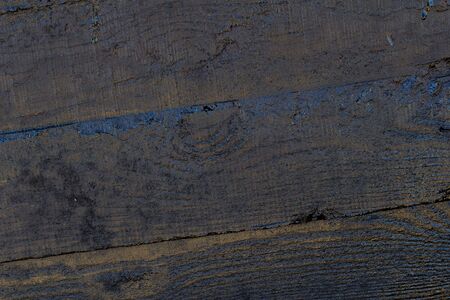 Black resin wall texture with scratches and cracks.の写真素材