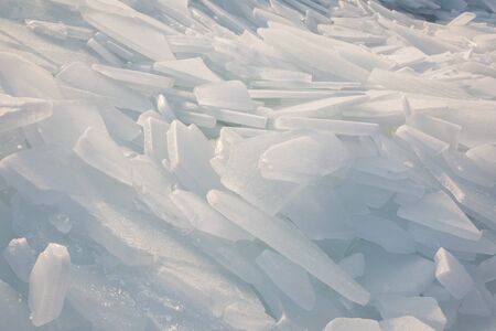 Large pieces of ice by the river in winter