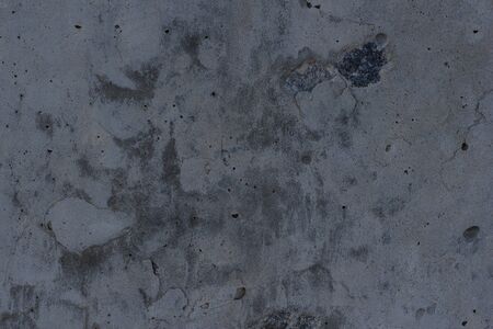 Dark gray texture of an old concrete wallの写真素材