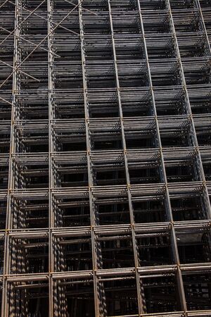 Metal mesh for reinforcing concrete floor and concrete surface at a construction siteの写真素材
