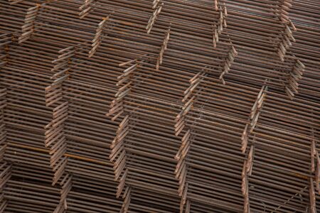 Metal mesh for reinforcing concrete floor and concrete surface at a construction siteの写真素材
