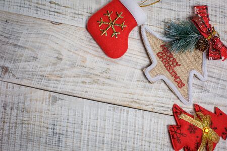 Christmas tree decorations on white wooden backgroundの写真素材