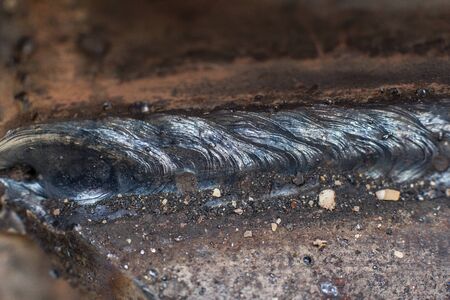 Welding seam on metal close on metal construction