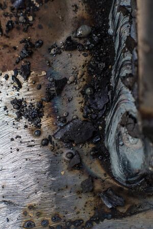Welding seam on metal close on metal constructionの写真素材