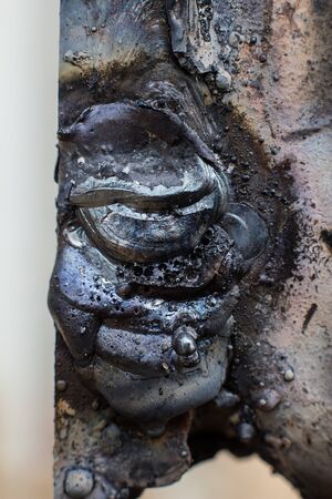 Welding seam on metal close on metal constructionの写真素材