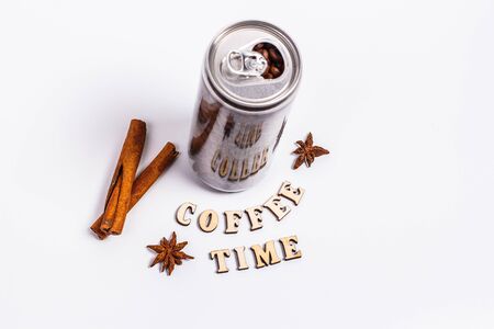 Coffee beans in a plastic jar on a white backgroundの写真素材