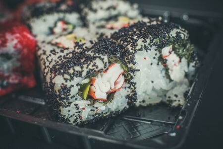 Different Asian sushi with dark wasabi sauce and wasabiの写真素材