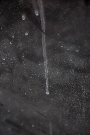 Different White spots on black glass for texture and designの写真素材