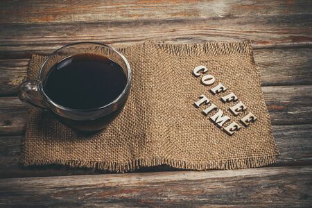 Aromatic tasty coffee in a glass cupの写真素材