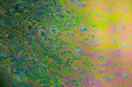 Soap bubble abstraction very close with movement and different colorsの写真素材