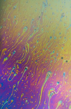 Soap bubble abstraction very close with movement and different colorsの写真素材
