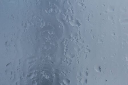 Heavily misted glass windows with water dropsの写真素材