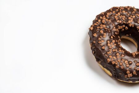Delicious pink and chocolate donuts on a white background