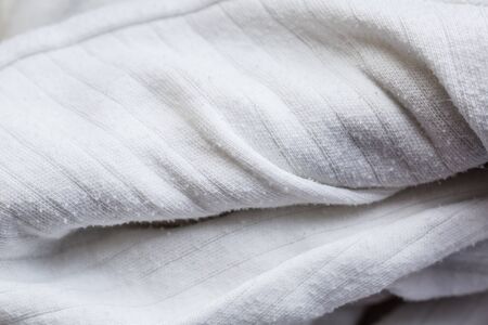 The texture of a white warm fabric in macro viewの写真素材