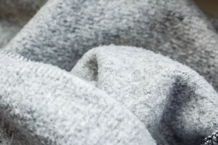 Texture white wool on clothes for warming in macro viewの写真素材