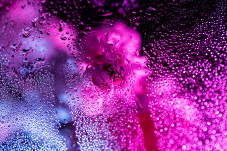 Wet or misted glass texture in pink and blue.の写真素材