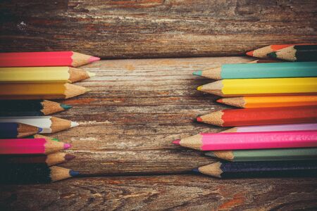 Colored pencils for drawing on a wooden backgroundの写真素材
