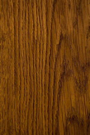 Texture of a brown dark board with fibersの写真素材