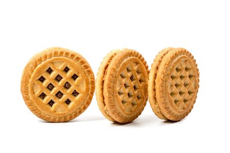 Round vanilla cookies on a white backgroundの写真素材