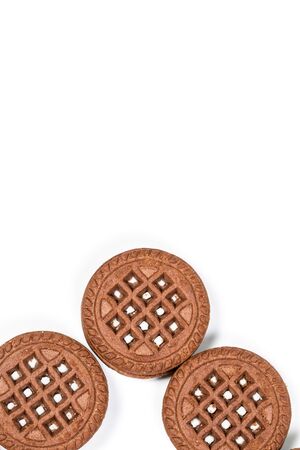 Round chocolate chip cookies on a white backgroundの写真素材