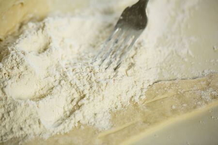 Fresh dough and flour for making pizza and dumplingsの写真素材