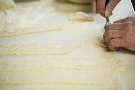Fresh dough and flour for making pizza and dumplings