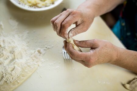 Fresh dough and flour for making pizza and dumplingsの写真素材