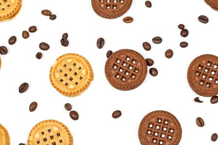 Chocolate and vanilla round cookies on a white backgroundの写真素材