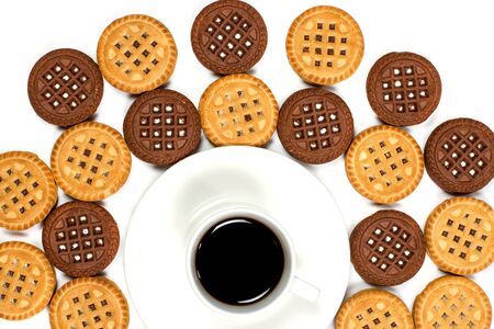 Round cookies and a cup of coffee on a white isolated backgroundの写真素材