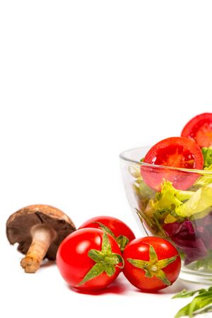 Fresh spring vegetables, salad, spices on a white backgroundの写真素材