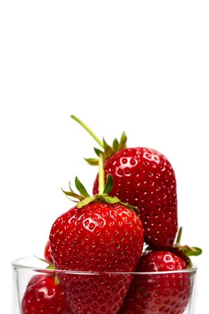 Ripe strawberries on a white background, closeの写真素材