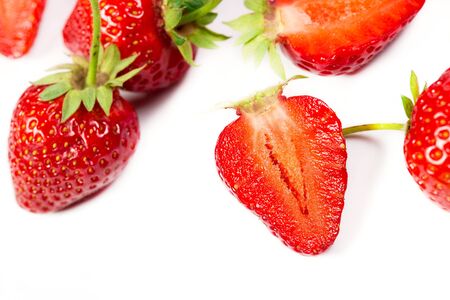 Ripe red strawberries on a white backgroundの写真素材