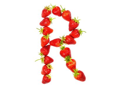 Letter R made from ripe strawberries on a white backgroundの写真素材