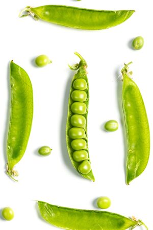 Ripe green peas on a white background, after assembly on the farmの写真素材