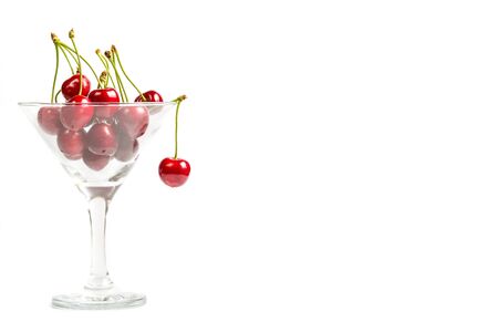 Ripe, red, sweet cherries on a white backgroundの写真素材