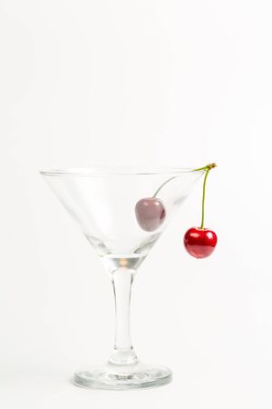 Ripe, red, sweet cherries on a white backgroundの写真素材
