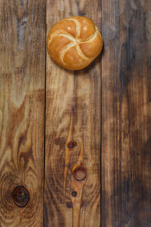 Sliced fresh gluten-free bread on wooden surface