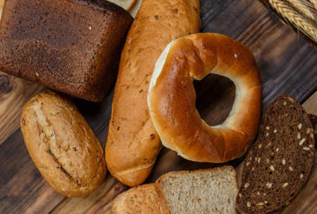 Sliced fresh gluten-free bread on wooden surface